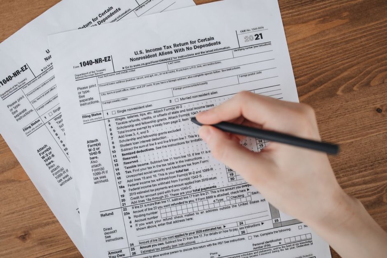 Person filling form - Demand Letter to a Third-Party Driver for Vehicle Damages
