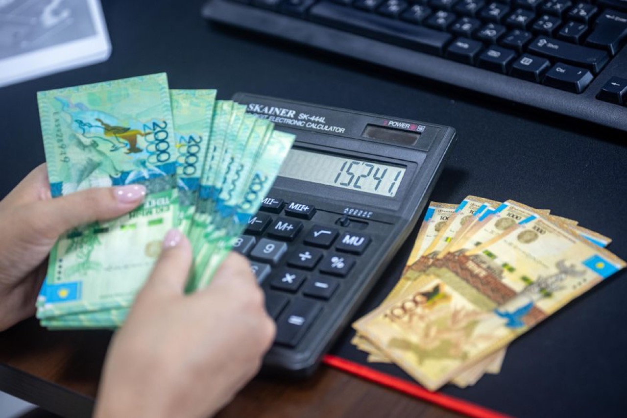 Calculator and money - What Does Comprehensive Car Insurance Cover?
